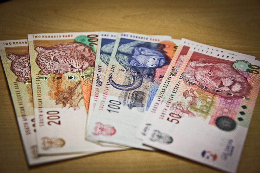 South African rand, Russian rouble rise; stocks at record high