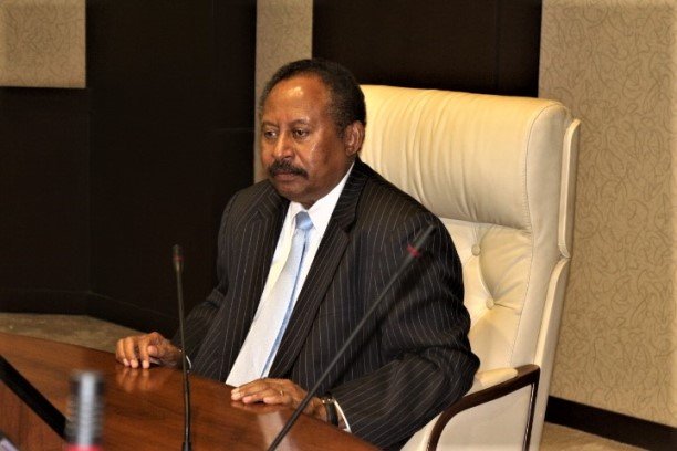 Sudan’s premier backs demands for justice as ICC prosecutor visits