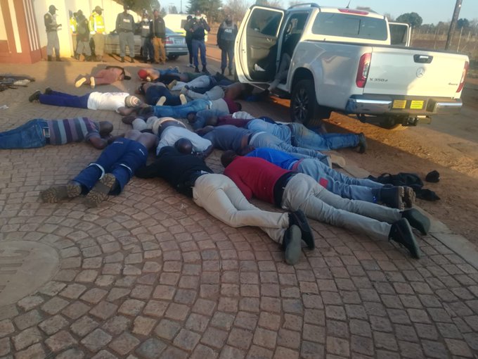 Five dead, 40 arrested and 25 firearms seized in church hostage drama