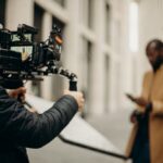 person-with-professional-camera-1024px
