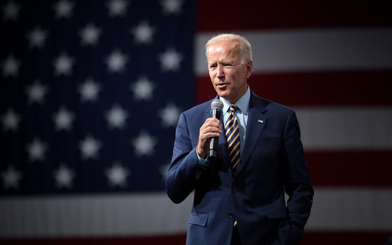 Biden promises help to U.S. workers hit by pandemic, Trump hints at 2024 run
