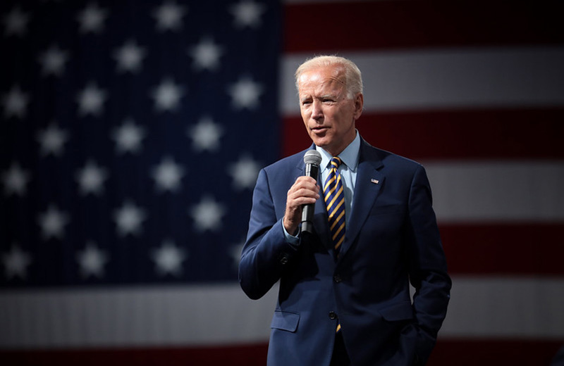 Biden promises help to U.S. workers hit by pandemic, Trump hints at 2024 run