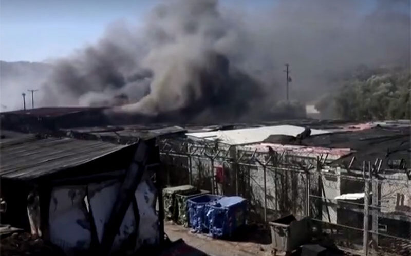 Thousands homeless after fire guts migrant camp on Greek island