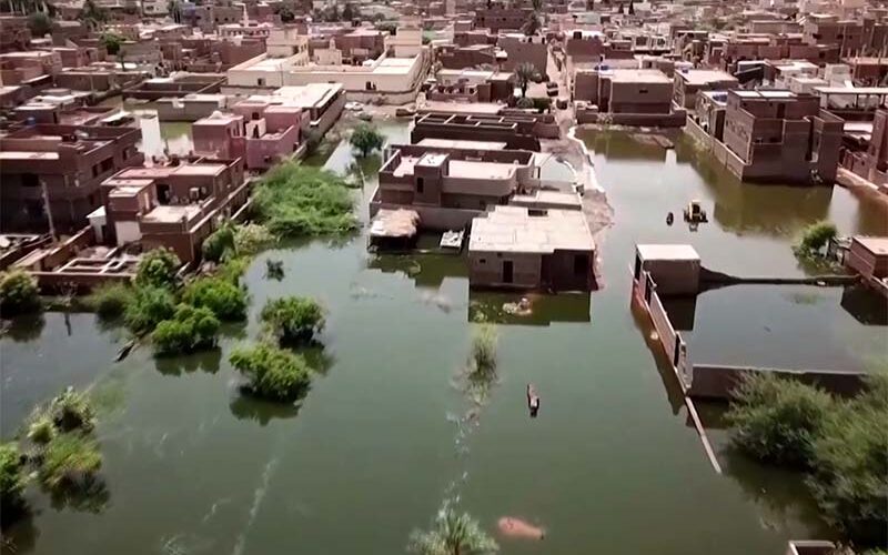 Made homeless by record floods, tens of thousands of Sudanese wait for aid