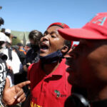 South African white farmers, Black protesters face off over farm murder