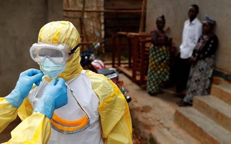 Guinea medics track suspected Ebola cluster after one case confirmed