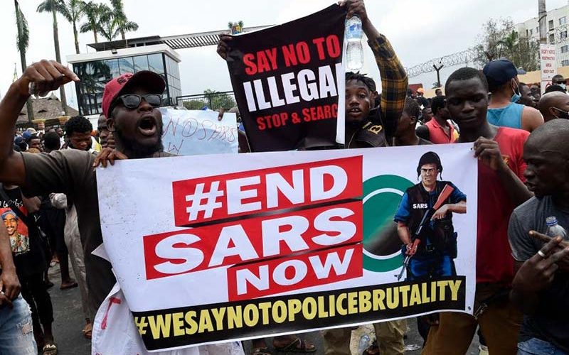 Protesters march on Nigerian parliament after army threatens to step in