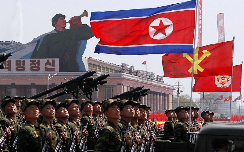 North Korea holds rare predawn military parade