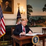 Trump averts state shutdown, Covid-19 aid fight drags on