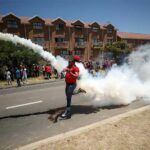 South African police fire tear gas during Cape anti-racism march