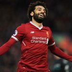 Police return a silver medal stolen from Salah's home in Cairo