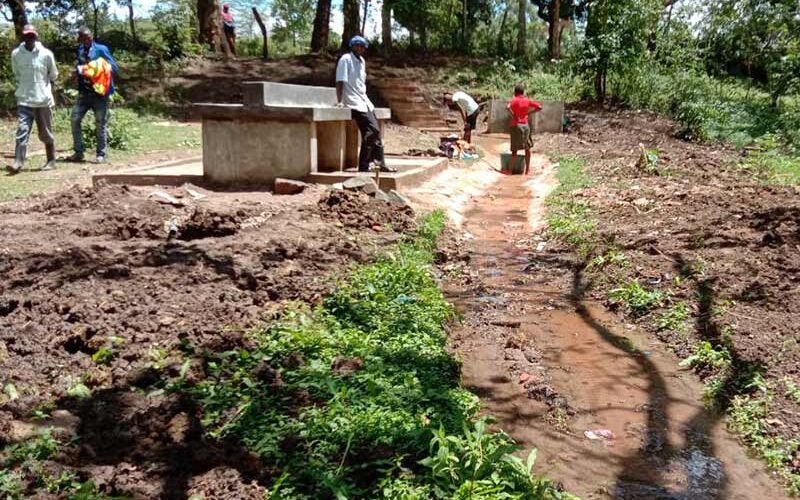 Kenyan villagers nurture local springs as founts of clean water