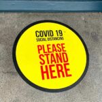 COVID-distance-sticker-belinda-fewings-unsplash