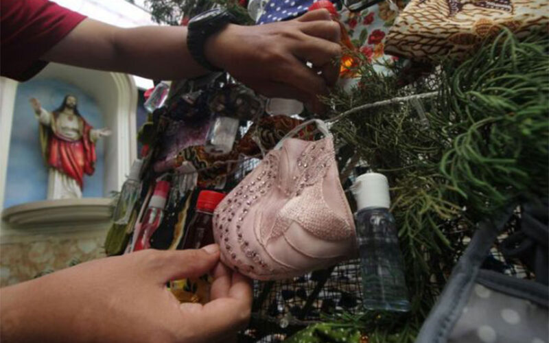Indonesia church decorates Christmas tree with masks, sanitisers to promote COVID awareness