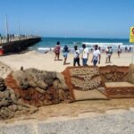 South Africa bans super-spreader events, closes beaches in response to spike in COVID-19  second wave infections