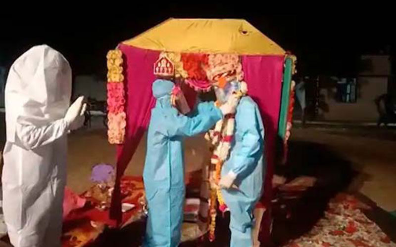 Indian wedding takes on otherworldly feel after bride tests positive for COVID-19