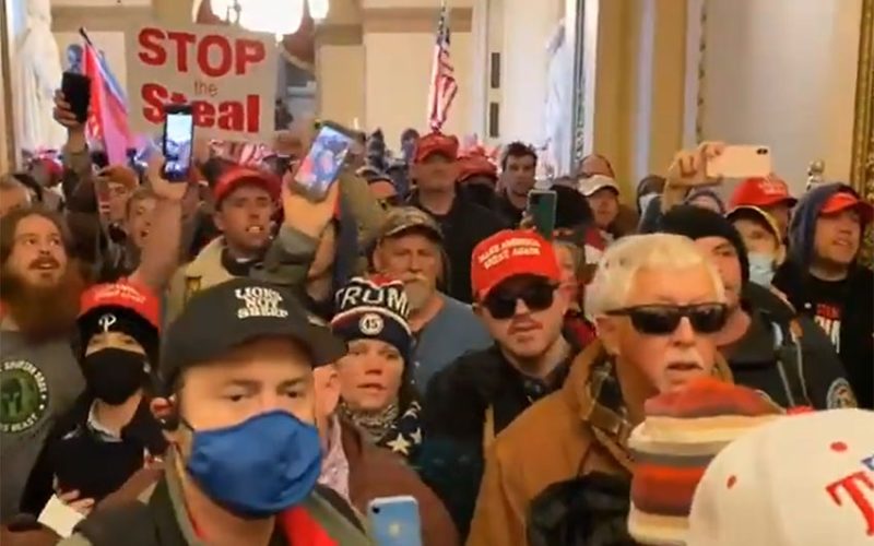 Guns and teargas as Trump supporters storm Capitol Hill