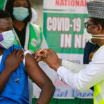Cheers and hope as doctor gets Nigeria's first COVID-19 vaccine