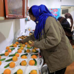 Eatimad-Mohamed-prepares-food-for-refugees