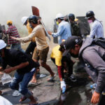 Myanmar-protesters-tear-gas