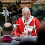 Pope Francis holds a mass on Palm Sunday
