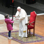 Children take centre stage at pope's scaled-back Good Friday service