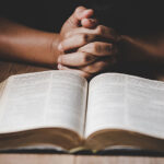 praying-hands-and-bible