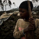 Congolese-child-evacuating-volcano-eruption