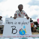 UGchild-climate-protest-sign