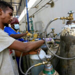 Sudanese search for oxygen cylinders