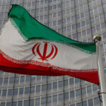 Iran says U.S. to lift oil sanctions, Germany, France cautious on matter