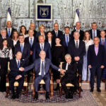 Israel’s-President-Reuven-Rivlin-sits-next-to-Prime-Minister-Naftali-Bennett