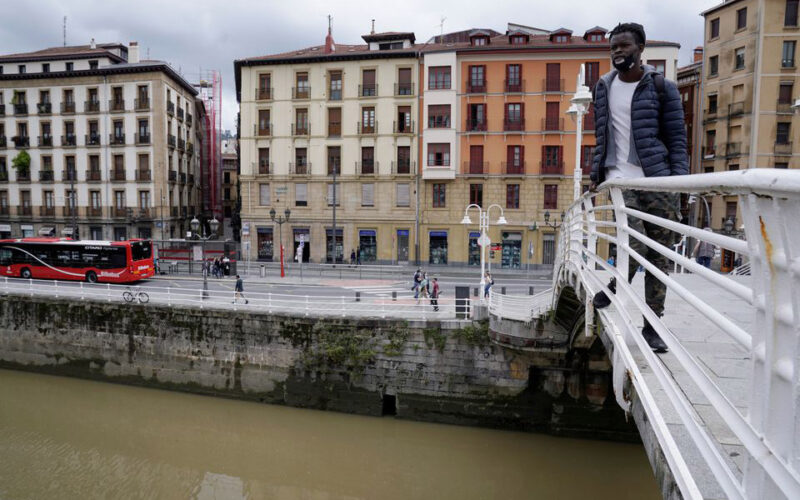 Senegalese migrant dives into river to save man