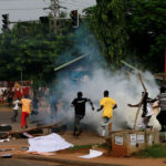 Nigerian police fire teargas to break up protests