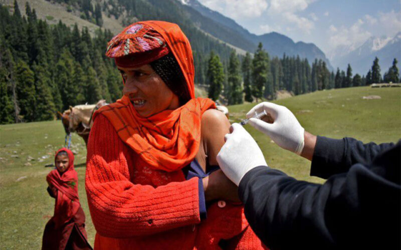 Indian medical workers scale mountains to bring vaccines to remote corners