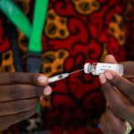 health-worker-with-corona-vaccine