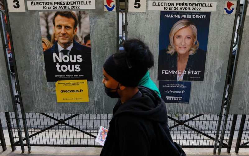 Macron and Le Pen head for French election runoff, projections show