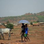 Eritrean-refugee-children-walk-outside-of-the-Adi-Harush-Refugee-camp