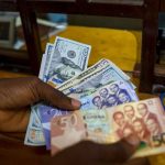 US-dollars-and-Ghanaian-cedis