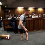 Jailed South African paralympic star Pistorius met victim's father