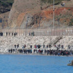 Migrants_fence-separating-Morocco_Spain