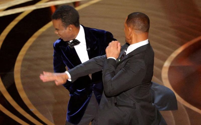 Chris Rock unleashes on Will Smith and wife Jada a year after Oscars slap