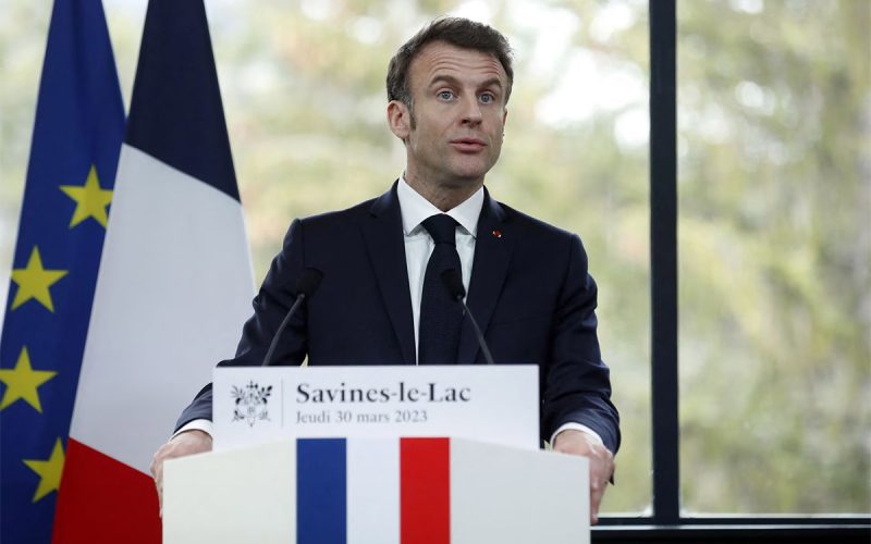 Embattled Macron heads to China, leaving burning Paris behind