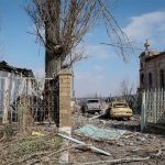 Ukraine_damagedcars-and-buildings
