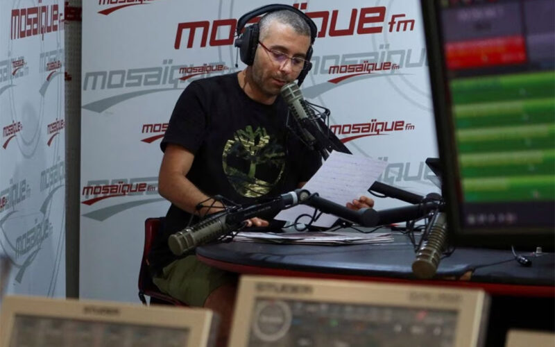 Tunisia police to investigate two top journalists, radio station says