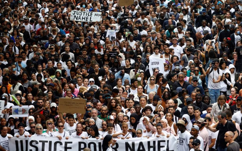 France unrest: Riots spread, thousands march in memory of shot teenager