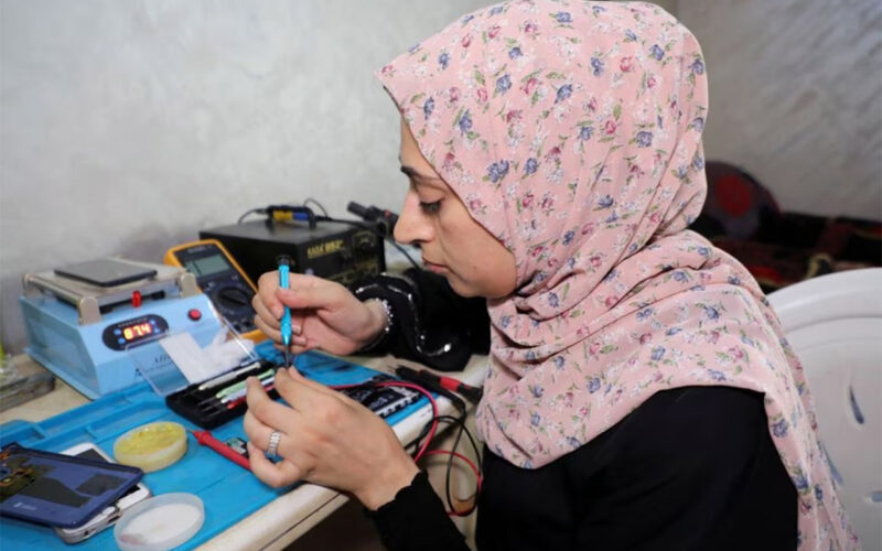 In conservative Gaza, a woman finds rare job niche by repairing phones
