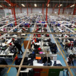 Kenyan-workers-prepare-clothes
