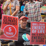 marching-against-the-use-of-fossil-fuels