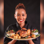Botswana_chef_Cathy_rubs_and_spices_3